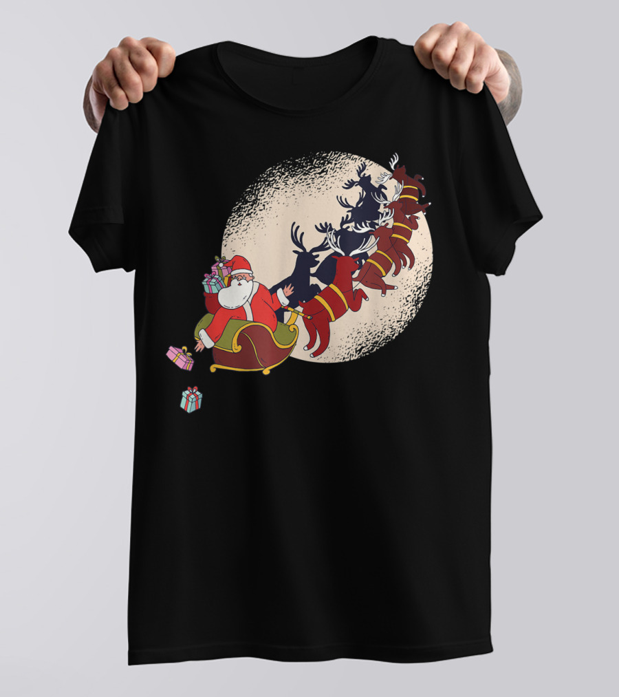 Santa Claus Flying With Reindeers Silhouette Under Full Moon Carrying Gift Sack T-Shirt