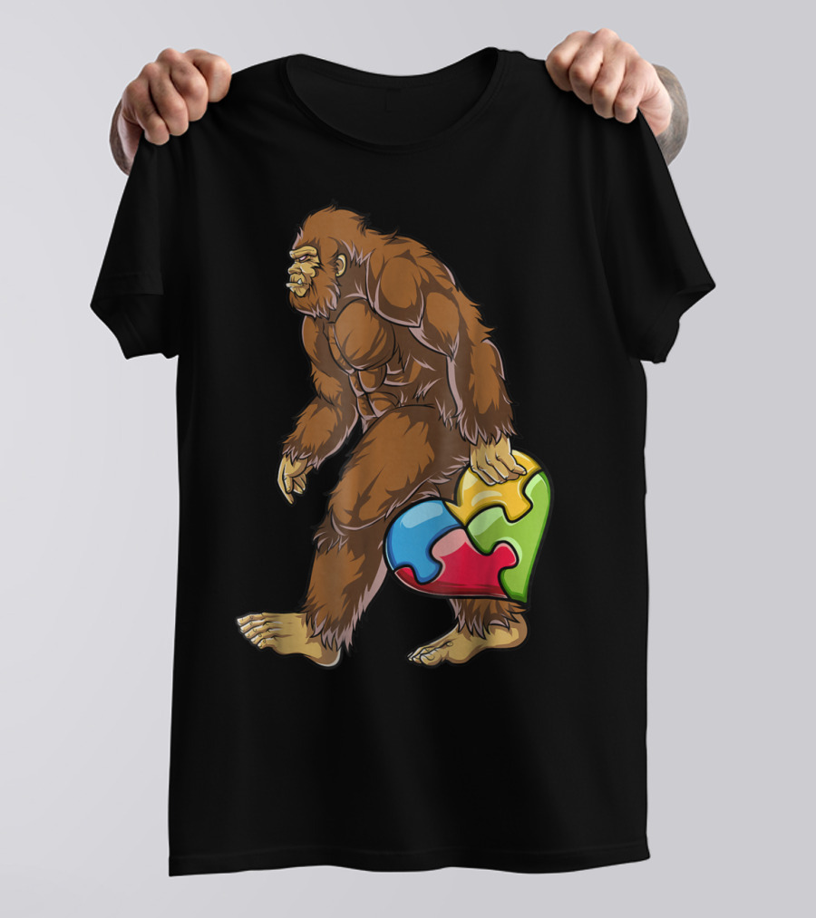 Bigfoot Carrying Heart Puzzle Piece Autism Awareness T-Shirt
