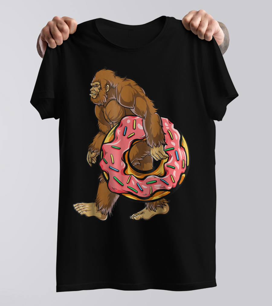 Bigfoot Sasquatch With Pink Sprinkle Donut For Women And Kids T-Shirt