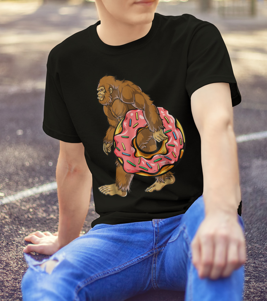 Bigfoot Sasquatch With Pink Sprinkle Donut For Women And Kids T-Shirt