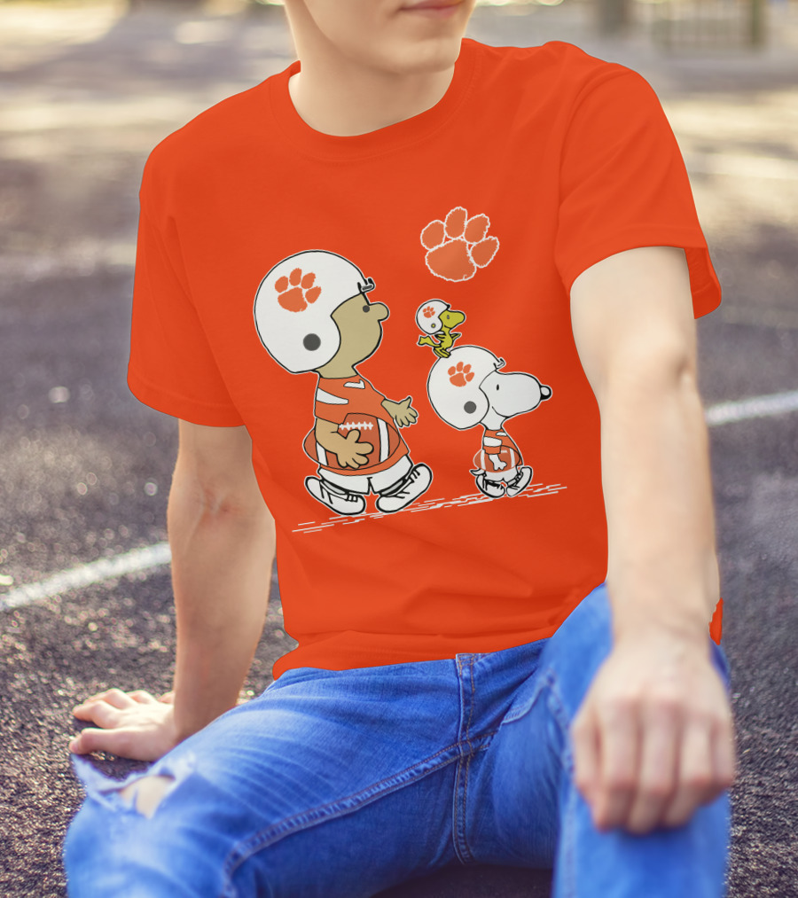 Clemson Tigers Snoopy Football Helmets And Paw Print Charlie Brown Woodstock T-Shirt