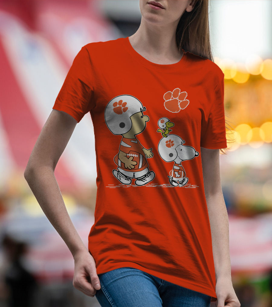 Clemson Tigers Snoopy Football Helmets And Paw Print Charlie Brown Woodstock T-Shirt