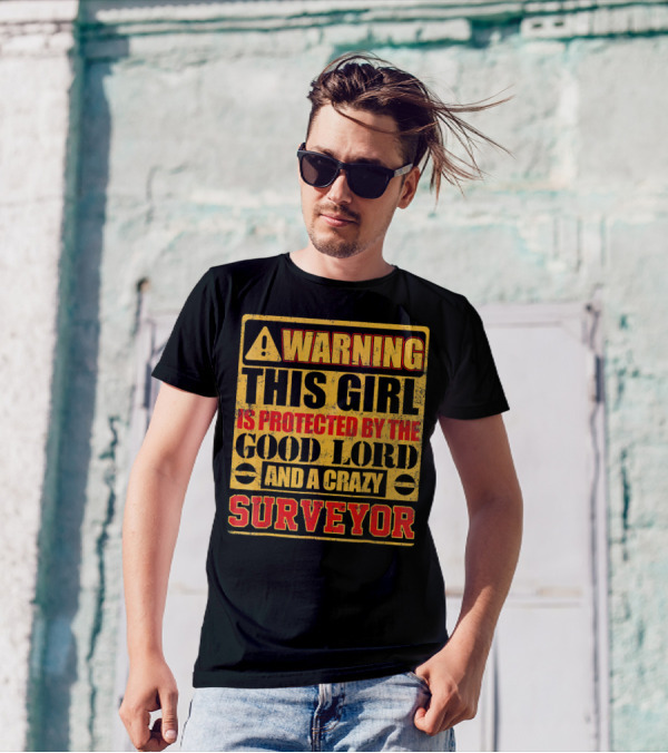 WARNING THIS GIRL IS PROTECTED BY THE GOOD LORD AND A CRAZY SURVEYOR T-Shirt