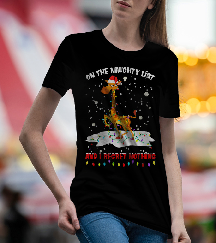 On The Naughty List And I Regret Nothing Giraffe Santa Hat Christmas Lights Snow T-Shirt