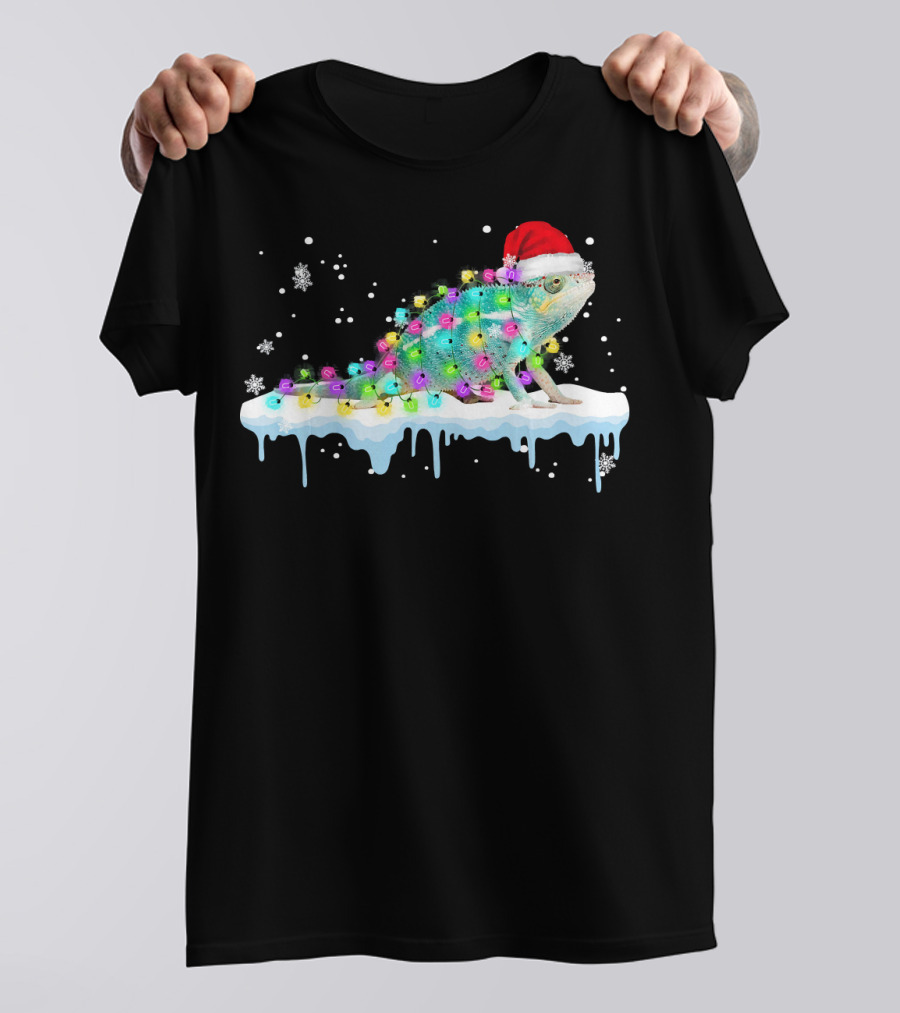 Chameleon Wrapped In Christmas Lights Wearing Santa Hat On Snow With Snowflakes T-Shirt