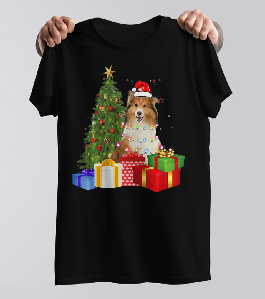Santa Sheltie Dog Wrapped In Christmas Tree Lights With Presents T-Shirt