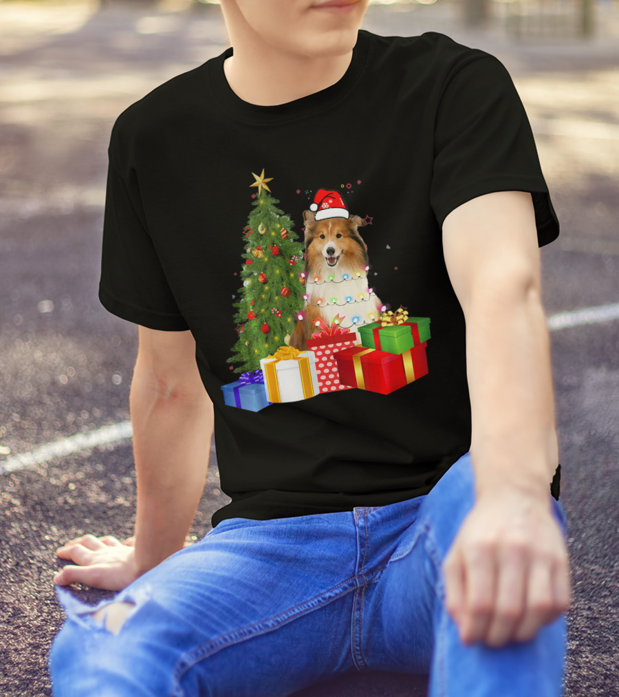 Santa Sheltie Dog Wrapped In Christmas Tree Lights With Presents T-Shirt