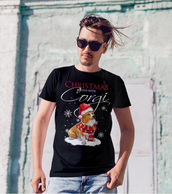 Christmas Begins With Corgi Wearing Santa Hat And Scarf Surrounded By Snowflakes T-Shirt