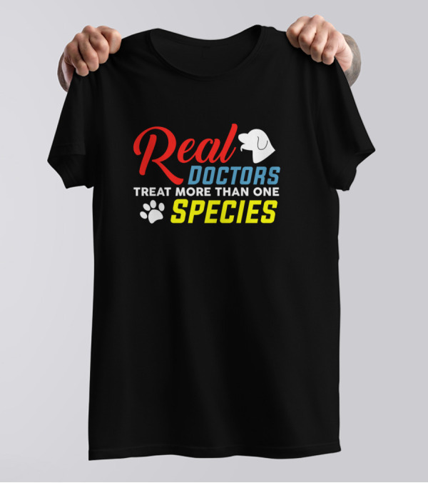 Real Doctors Treat More Than One Species Paw Print Dog T-Shirt
