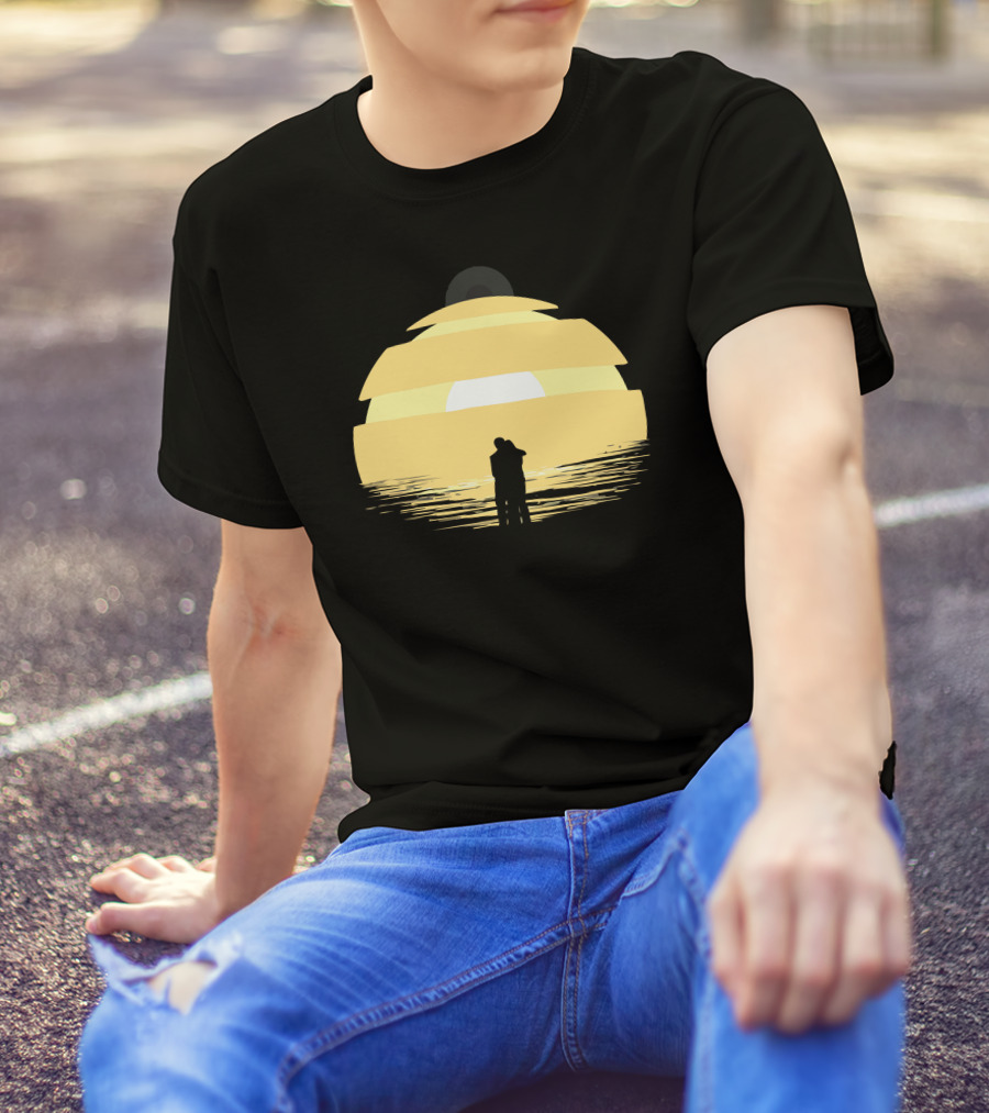 Two Rogues Embracing At Sunset Over Ocean Horizon T-Shirt