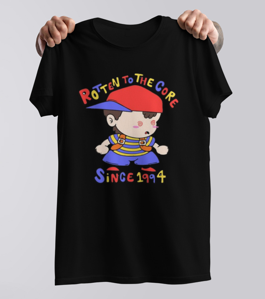 Rotten To The Core Since 1994 Cartoon Character With Red Cap And Striped T-Shirt