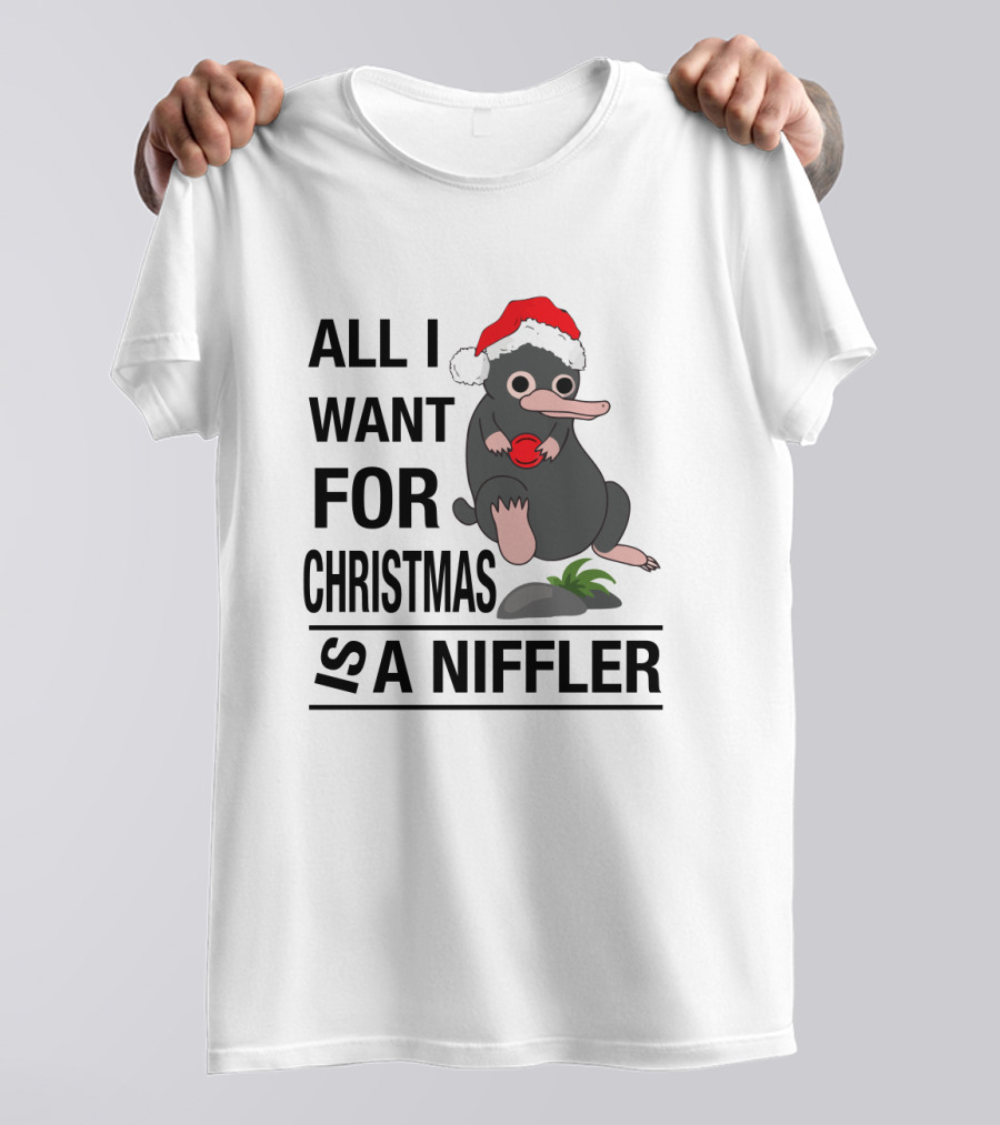 All I Want For Christmas Is A Niffler Wearing Santa Hat Holding Red T-Shirt