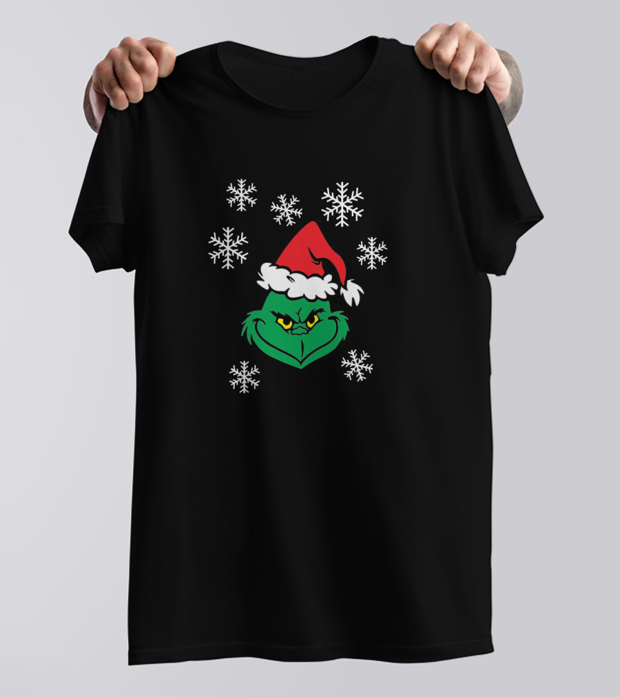 Grinch Face With Santa Hat Surrounded By Snowflakes Iconic Holiday Character T-Shirt