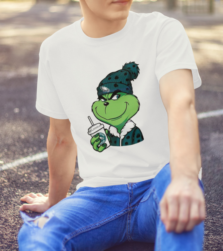 Grinch Holding Cup Wearing Philadelphia Eagles Beanie T-Shirt