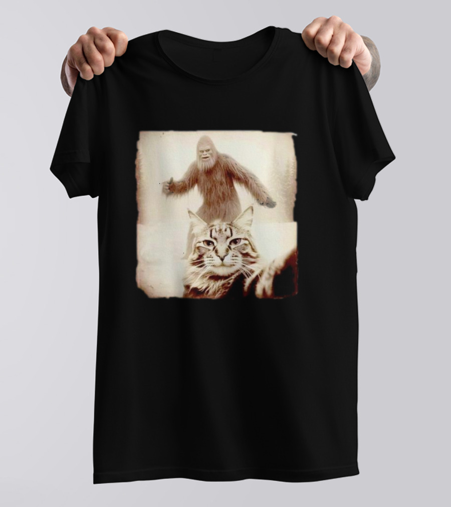 Cat Taking Selfie With Bigfoot In Snowy Forest Scene T-Shirt