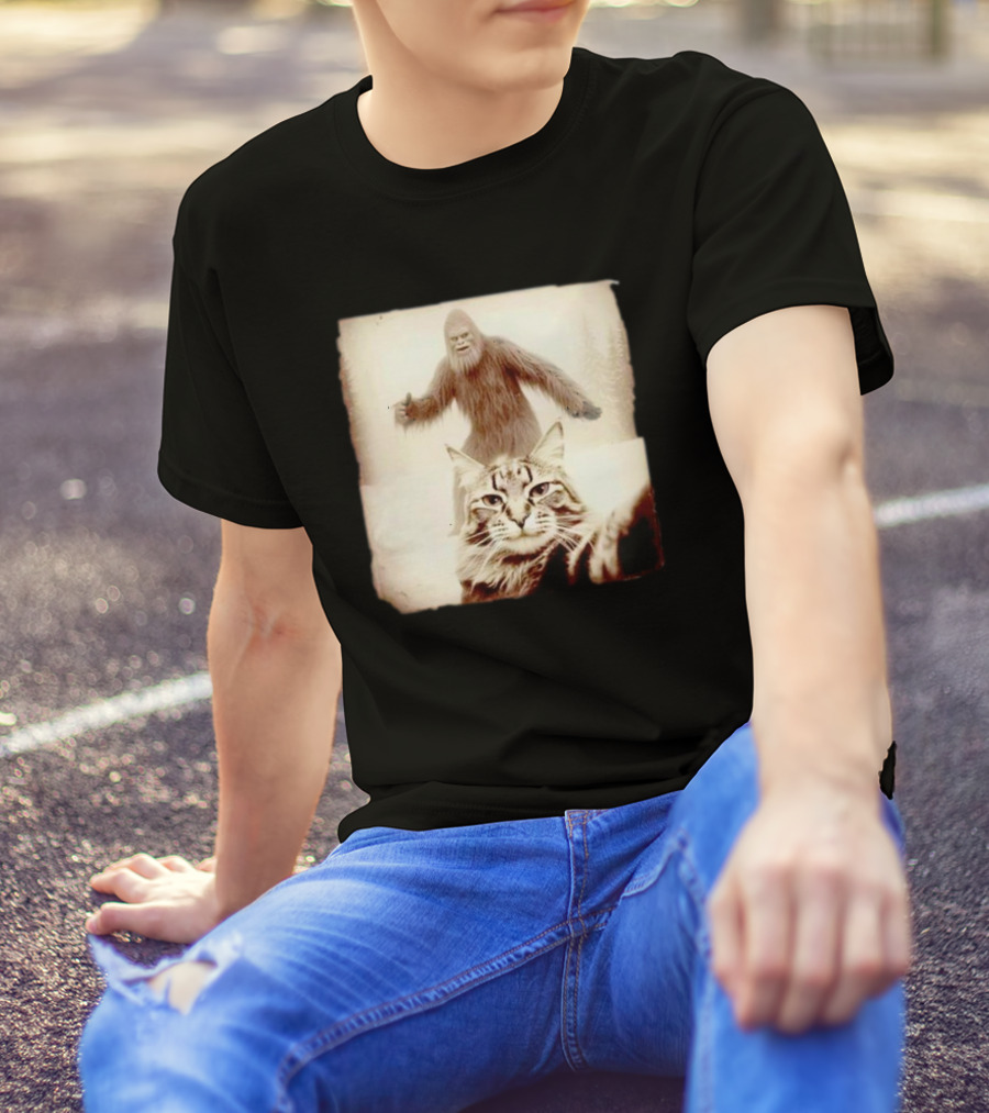 Cat Taking Selfie With Bigfoot In Snowy Forest Scene T-Shirt