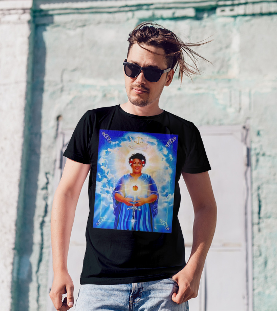Stacey Abrams Patron Saint Of Fairness In Voting With Scales Of Justice Halo And Glowing Apple In Celestial Clouds T-Shirt