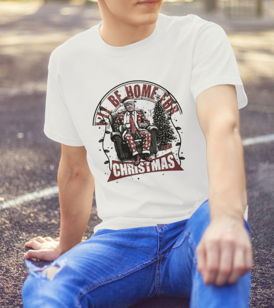 I'LL BE HOME FOR CHRISTMAS Donald Trump Sitting By Christmas Tree T-Shirt
