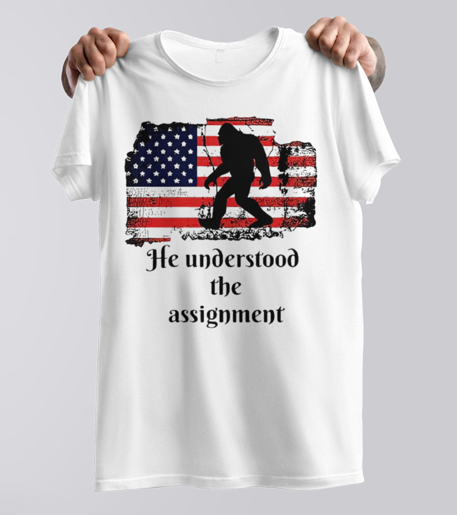 Bigfoot Silhouette With Distressed American Flag He Understood The Assignment T-Shirt