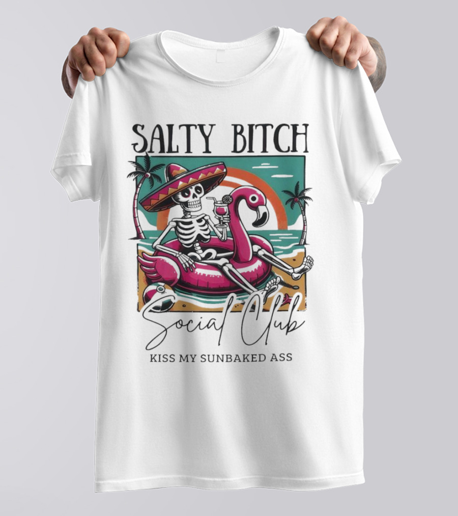 Salty Bitch Skeleton On Flamingo Float In Sunset Beach Scene With Kiss My Sunbaked Ass Text T-Shirt