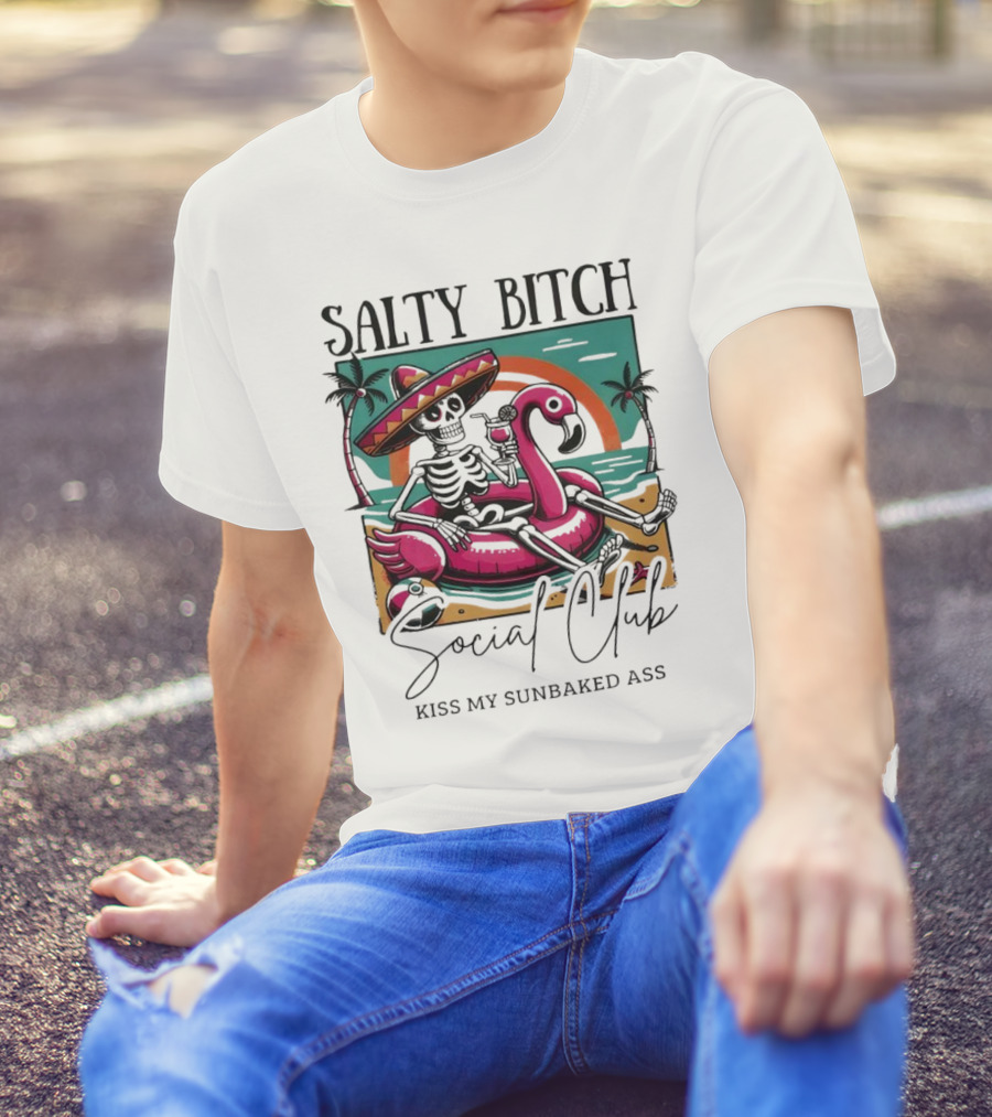 Salty Bitch Skeleton On Flamingo Float In Sunset Beach Scene With Kiss My Sunbaked Ass Text T-Shirt