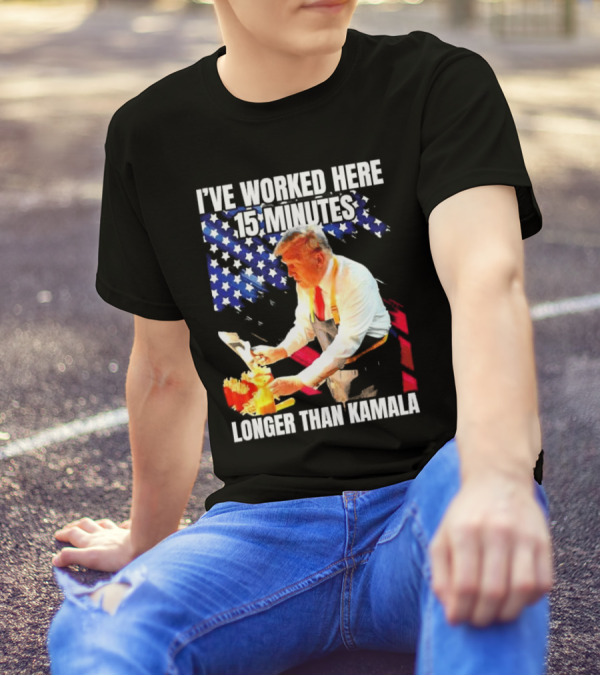 I’ve Worked Here 15 Minutes Longer Than Kamala Donald Trump American Flag Background T-Shirt