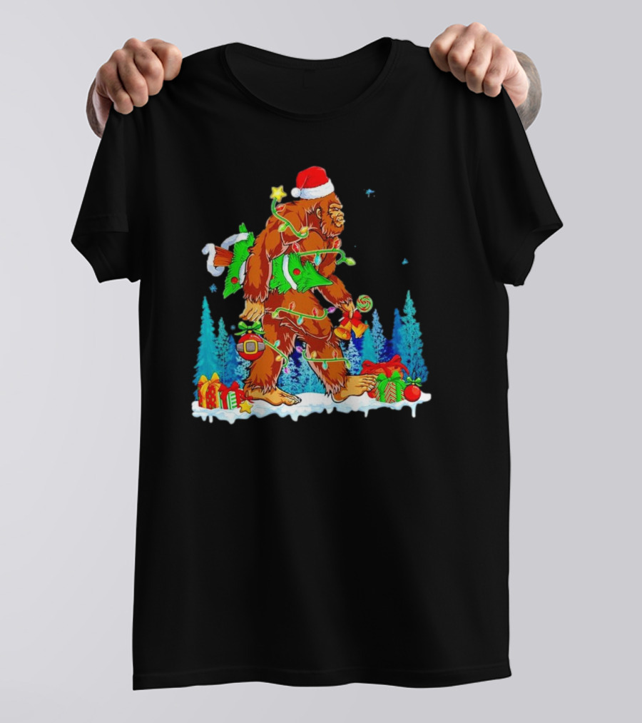 Bigfoot Santa Hugging Christmas Tree With Gifts And Snow Scene T-Shirt