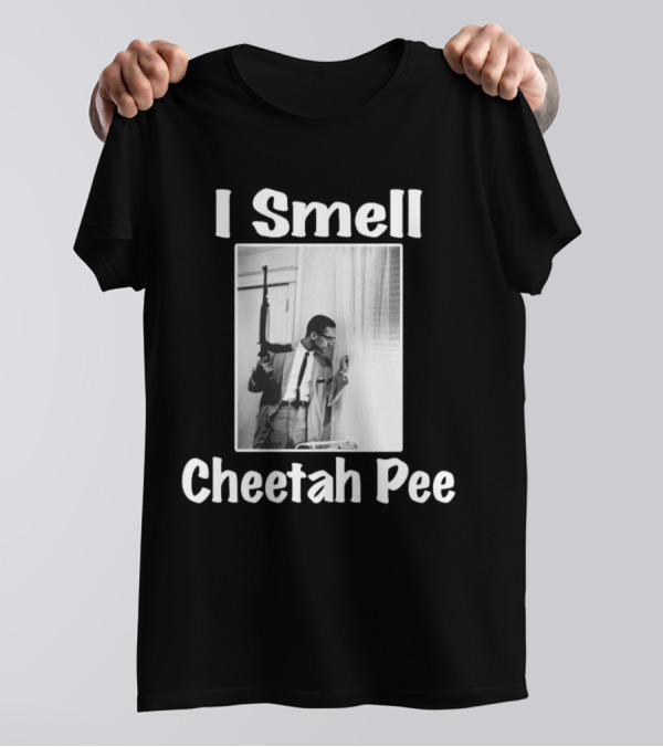 I Smell Cheetah Pee Man Holding Gun By Window T-Shirt