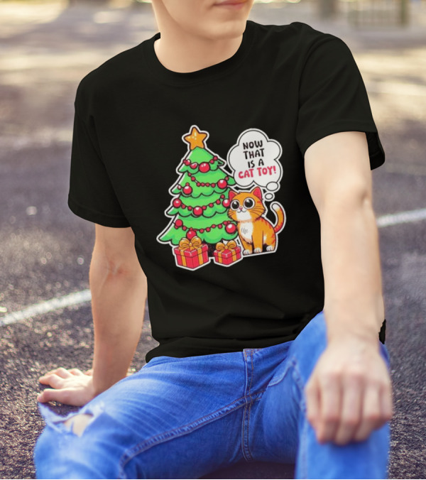 Now That Is A Cat Toy A Cute Orange Cat With Wide Eyes Next To Decorated Christmas Tree T-Shirt