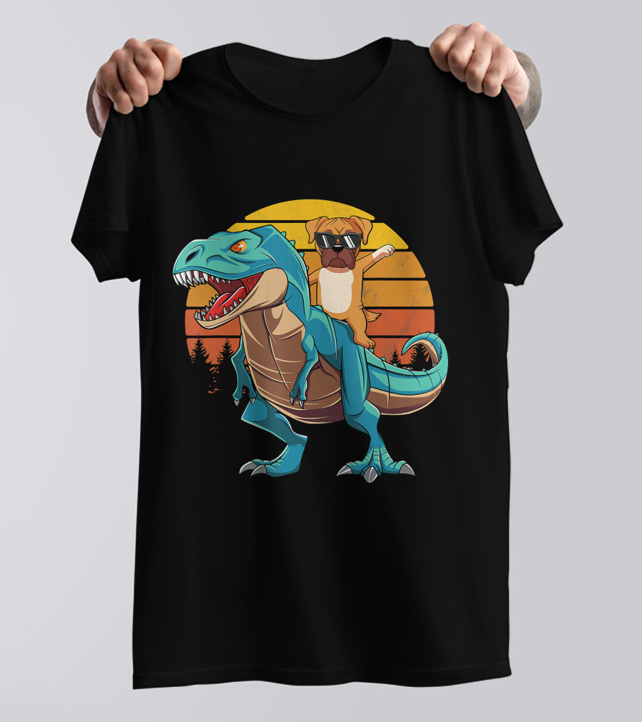 Boxer Dog With Sunglasses Riding Blue T-Rex Against Sunset Background T-Shirt